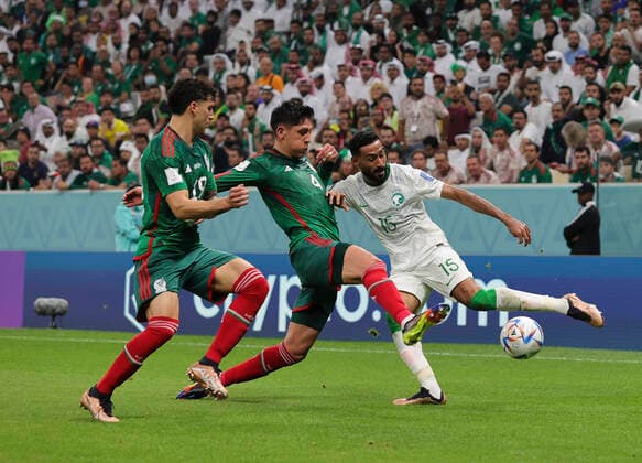 Saudi Arabia v Mexico 2022 FIFA World Cup, WM, Weltmeisterschaft, Fussball Ali Al-Hassan of Saudi Arabia in possession whilst under pressure from Edson Alvarez and Jorge Sanchez of Mexico during the 2022 FIFA World Cup Group C match at Lusail Stadium, Lusail Content Not Available For UK Newspapers Copyright: xPaulxChestertonx FIL-17655-0094 UK Newspapers OUT