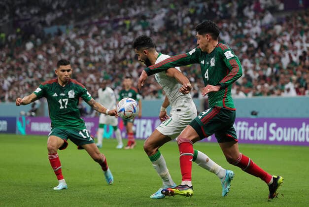 Saudi Arabia v Mexico 2022 FIFA World Cup, WM, Weltmeisterschaft, Fussball Ali Al-Hassan of Saudi Arabia battles with Edson Alvarez of Mexico during the 2022 FIFA World Cup Group C match at Lusail Stadium, Lusail Content Not Available For UK Newspapers Copyright: xPaulxChestertonx FIL-17655-0095 UK Newspapers OUT