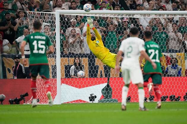 Mandatory Credit: Photo by Dave Shopland Shutterstock (13640353be) Saudi Arabia goalkeeper Mohammed Al-Owais saves a free kick from Luis Chavez of Mexico Saudi Arabia v Mexico, FIFA World Cup, WM, Weltmeisterschaft, Fussball 2022, Group C, Football, Lusail Stadium, Al Daayen, Qatar - 30 Nov 2022 Editorial Use Only Saudi Arabia v Mexico, FIFA World Cup 2022, Group C, Football, Lusail Stadium, Al Daayen, Qatar - 30 Nov 2022 Editorial Use Only Copyright: xDavexShopland Shutterstockx 13640353be