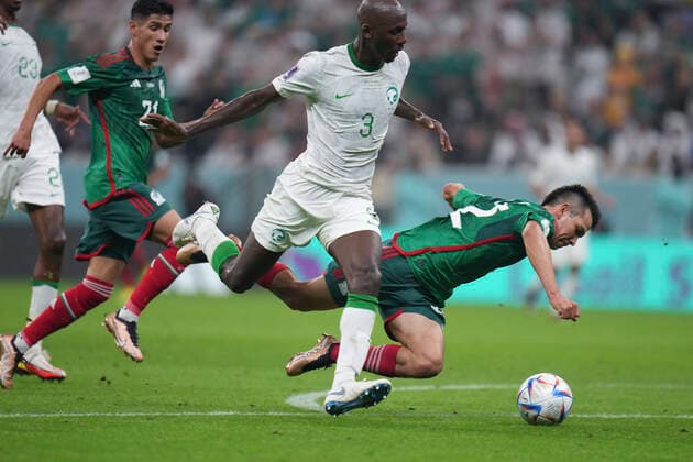 (221130) -- LUSAIL, Nov. 30, 2022 -- Hirving Lozano (1st R) of Mexico vies with Abdullah Madu (2nd R) of Saudi Arabia during the Group C match between Saudi Arabia and Mexico at the 2022 FIFA World Cup, WM, Weltmeisterschaft, Fussball at Lusail Stadium in Lusail, Qatar, Nov. 30, 2022. ) (SP)QATAR-LUSAIL-2022 WORLD CUP-GROUP C-KSA VS MEX MengxDingbo 
