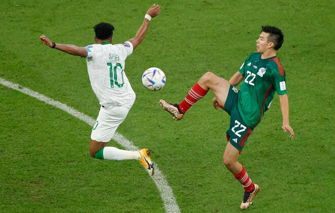 Salem Aldawsari (L) of Saudi Arabia vies for the ball with Hirving Lozano of Mexico during a group stage match of the Qatar 2022 Soccer World Cup between Saudi Arabia and Mexico at the Lusail stadium, Qatar 30 November 2022. Soccer World Cup: Saudi Arabia - Mexico !ACHTUNG: NUR REDAKTIONELLE NUTZUNG!  Copyright: xEstebanxBibax GR3450 20221130-5aae57f54206c162d88b3b5078ea344c8c9f2d1b
