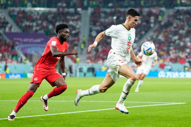 Canada v Morocco: Group F - FIFA World Cup, WM, Weltmeisterschaft, Fussball Qatar 2022 Junior Hoilett Left Winger of Canada and Reading FC and Nayef Aguerd centre-back of Morocco and West Ham United compete for the ball during the FIFA World Cup Qatar 2022 Group F match between Canada and Morocco at Al Thumama Stadium on December 1, 2022 in Doha, Qatar. Doha Qatar  Copyright: xJosexBretonx originalFilename:breton-canadavm221201_npmQ6.jpg