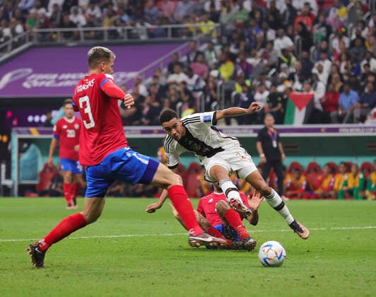 Costa Rica v Germany 2022 FIFA World Cup, WM, Weltmeisterschaft, Fussball Celso Borges of Costa Rica tackles Jamal Musiala of Germany during the 2022 FIFA World Cup Group E match at Al Bayt Stadium, Al Bayt Content Not Available For UK Newspapers Copyright: xPaulxChestertonx FIL-17657-0086 UK Newspapers OUT