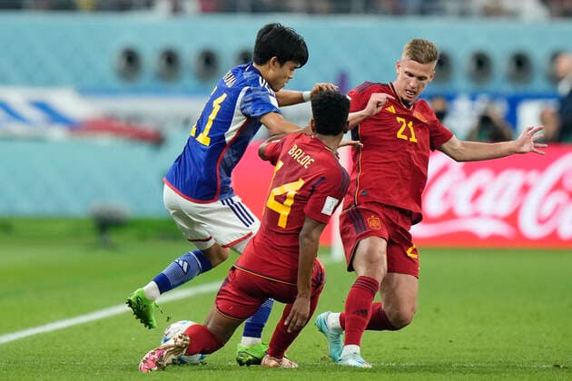 Japan v Spain: Group E - FIFA World Cup, WM, Weltmeisterschaft, Fussball Qatar 2022 Takefusa Kubo Right Winger of Japan and Real Sociedad and Dani Olmo attacking midfield of Spain and RB Leipzig compete for the ball during the FIFA World Cup Qatar 2022 Group E match between Japan and Spain at Khalifa International Stadium on December 1, 2022 in Doha, Qatar. Doha Qatar  Copyright: xJosexBretonx originalFilename:breton-japanvsp221201_npYat.jpg
