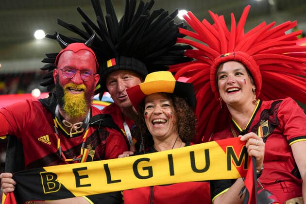 (221201) -- AL RAYYAN, Dec. 1, 2022 -- Fans of Belgium pose for photos before the Group F match between Croatia and Belgium at the 2022 FIFA World Cup, WM, Weltmeisterschaft, Fussball at Ahmad Bin Ali Stadium in Al Rayyan, Qatar, Dec. 1, 2022. ) (SP)QATAR-AL RAYYAN-2022 WORLD CUP-GROUP F-CRO VS BEL ZhengxHuansong 