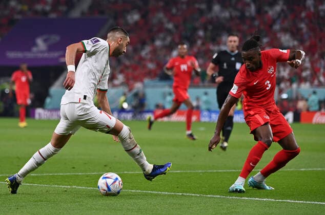 (221201) -- DOHA, Dec. 1, 2022 -- Hakim Ziyech (L) of Morocco controls the ball during the Group F match between Canada and Morocco at the 2022 FIFA World Cup, WM, Weltmeisterschaft, Fussball at Al Thumama Stadium in Doha, Qatar, Dec. 1, 2022. ) (SP)QATAR-DOHA-2022 WORLD CUP-GROUP F-CAN VS MAR ChenxCheng 