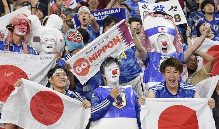 Football World Cup in Qatar Japan supporters celebrate the team s 2-1 win over Spain in a World Cup Group E football match at Khalifa International Stadium in Doha, Qatar, on Dec. 1, 2022. Japan advanced to the round of 16.  A14AA0001368756P 