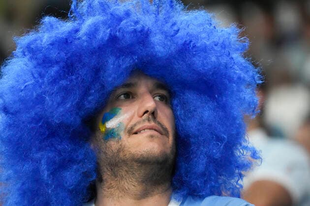 (221202) -- AL WAKRAH, Dec. 2, 2022 -- A fan of Uruguay waits for the start of the Group H match between Ghana and Uruguay at the 2022 FIFA World Cup, WM, Weltmeisterschaft, Fussball at Al Janoub Stadium in Al Wakrah, Qatar, Dec. 2, 2022. ) (SP)QATAR-AL WAKRAH-2022 WORLD CUP-GROUP H-GHA VS URU LixGang 