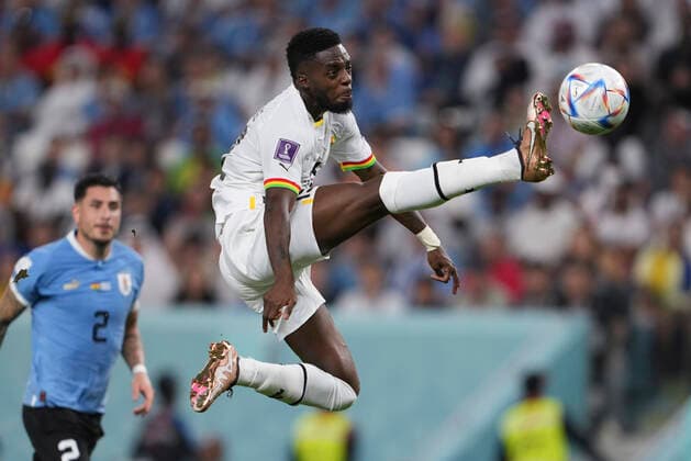 (221202) -- AL WAKRAH, Dec. 2, 2022 -- Inaki Williams of Ghana vies for the ball during the Group H match between Ghana and Uruguay at the 2022 FIFA World Cup, WM, Weltmeisterschaft, Fussball at Al Janoub Stadium in Al Wakrah, Qatar, Dec. 2, 2022. ) (SP)QATAR-AL WAKRAH-2022 WORLD CUP-GROUP H-GHA VS URU ZhengxHuansong 