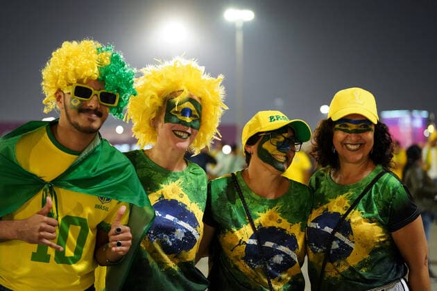 LUSAIL, QATAR - DECEMBER 2: Supporters of Brazil pose for a photo prior to the FIFA World Cup, WM, Weltmeisterschaft, Fussball Qatar 2022 group G match between Brazil and Cameroon at Lusail Stadium on December 2, 2022 in Lusail, Qatar. (Photo by Florencia Tan Jun PxImages Icon Sportswire) SOCCER: DEC 02 FIFA World Cup - Brazil v Cameroon Icon221202540