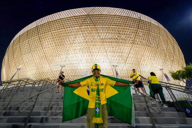 LUSAIL, QATAR - DECEMBER 2: Supporter of Brazil, sons of World Cup icon Clovis Acosta Fernandes pose for a photo prior to the FIFA World Cup, WM, Weltmeisterschaft, Fussball Qatar 2022 group G match between Brazil and Cameroon at Lusail Stadium on December 2, 2022 in Lusail, Qatar. (Photo by Florencia Tan Jun PxImages Icon Sportswire) SOCCER: DEC 02 FIFA World Cup - Brazil v Cameroon Icon221202541