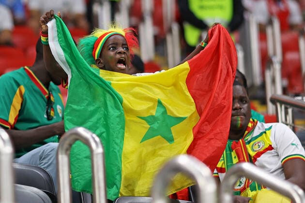 4th December 2022; Al Bayt stadium, Doha, Qatar: FIFA World Cup, WM, Weltmeisterschaft, Fussball football, final 16, England versus Senegal: Senegal fans take in the atmosphere before the game  ActionPlus12456135 HeulerxAndrey Content restricted for UK based newspaper