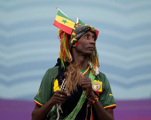 AL KHOR, QATAR - DECEMBER 04: A Senegal fan before the FIFA World Cup, WM, Weltmeisterschaft, Fussball Qatar 2022 Round of 16 match between England and Senegal at Al Bayt Stadium on December 4, 2022 in Al Khor, Qatar. (Photo by Sebastian Frej) WCS  Copyright: xSebastianxFrej