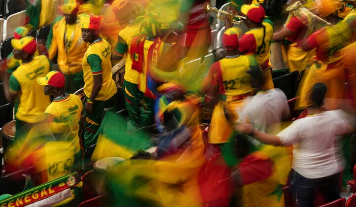 (221204) -- AL KHOR, Dec. 4, 2022 -- Fans of Senegal cheer prior to the Round of 16 match between England and Senegal of the 2022 FIFA World Cup, WM, Weltmeisterschaft, Fussball at Al Bayt Stadium in Al Khor, Qatar, Dec. 4, 2022. ) (SP)QATAR-AL KHOR-2022 WORLD CUP-ROUND OF 16-ENG VS SEN LixGang 