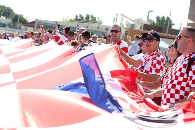 200-meter-long Croatian flag Croatian fans unfurled a 200-meter-long flag in front of the Hilton Hotel in Doha, Qatar on December 5, 2022. GoranxStanzl PIXSELL