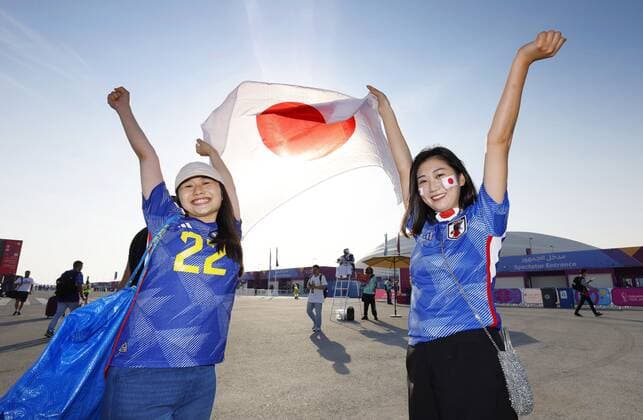 Football World Cup in Qatar Japan supporters cheer near Al Janoub Stadium in Al Wakrah, Qatar, on Dec. 5, 2022, ahead of a World Cup round of 16 football match against Croatia.  A14AA0001370565P 
