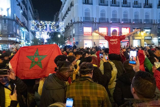 Moroccan fans celebrate in Madrid the victory at the Qatar 2022 Football World Cup December 6, 2022 - Madrid, Spain: Moroccan fans with Moroccan flags celebrate in Madrid, Spain after their national team, Nationalteam beat Spain on penalties at the Qatar 2022 Football World Cup Madrid Madrid Spain Copyright: AlvaroxLaguna