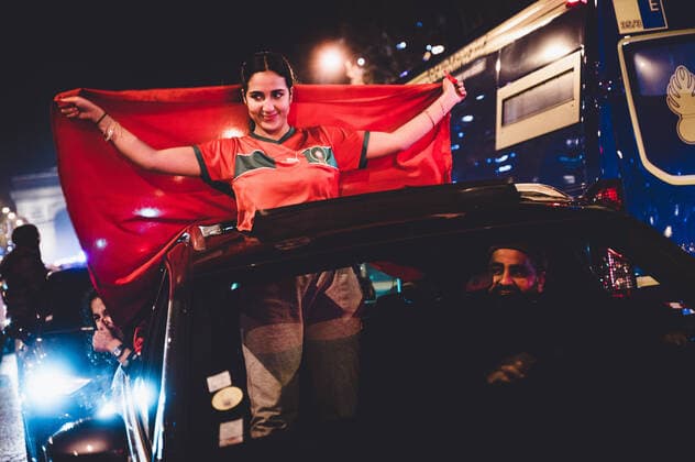 Moroccan Football Team Supporters Celebrate Victory In Paris Supporters of the Moroccan national football team and members of the Moroccan community celebrate their team s victory in the round of 16 of the 2022 World Cup and their historic qualification for the quarter-finals on the avenue des CHamps-Elysees in Paris, December 6, 2022. Paris France  Copyright: xSamuelxBoivinx originalFilename:boivin-moroccan221206_npmy7.jpg