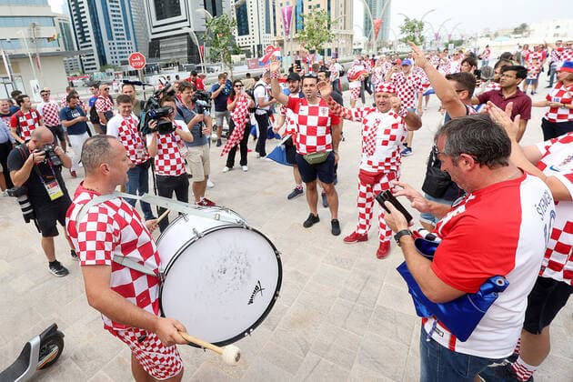 PXL_QATAR 2022 _Croatian fans Good atmosphere of Croatian fans in front of the Hilton Doha hotel for support the Croatia national team, Nationalteam before the Qatar World Cup quarter-final match in against Brazil, in Doha, Qatar, on December 9, 2022. GoranxStanzl PIXSELL