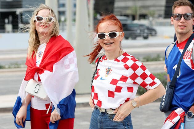 PXL_QATAR 2022 _Croatian fans Good atmosphere of Croatian fans in front of the Hilton Doha hotel for support the Croatia national team, Nationalteam before the Qatar World Cup quarter-final match in against Brazil, in Doha, Qatar, on December 9, 2022. GoranxStanzl PIXSELL