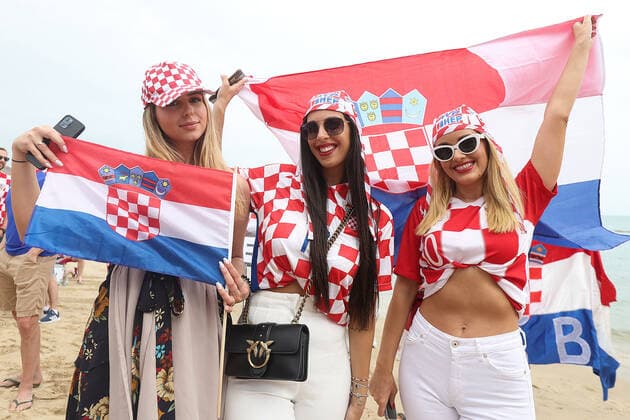 PXL_QATAR 2022 _Croatian fans Good atmosphere of Croatian fans in front of the Hilton Doha hotel for support the Croatia national team, Nationalteam before the Qatar World Cup quarter-final match in against Brazil, in Doha, Qatar, on December 9, 2022. GoranxStanzl PIXSELL