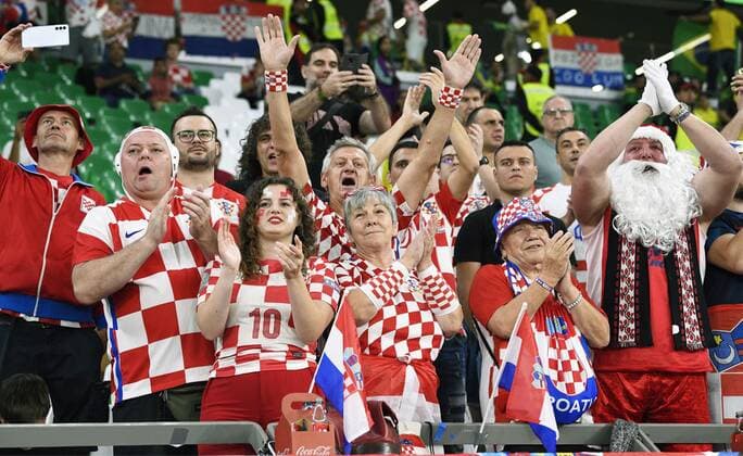 Football World Cup in Qatar Croatia supporters cheer ahead of a World Cup quarterfinal football match against Brazil at Education City Stadium in Al Rayyan, Qatar, on Dec. 9, 2022.  A14AA0001373412P 