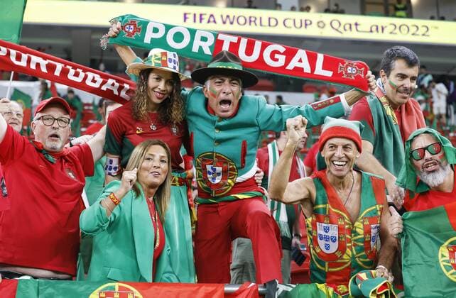 Football World Cup in Qatar Portugal supporters cheer ahead of a World Cup quarterfinal football match against Morocco at Al Thumama Stadium in Doha, Qatar, on Dec. 10, 2022.  A14AA0001373735P 