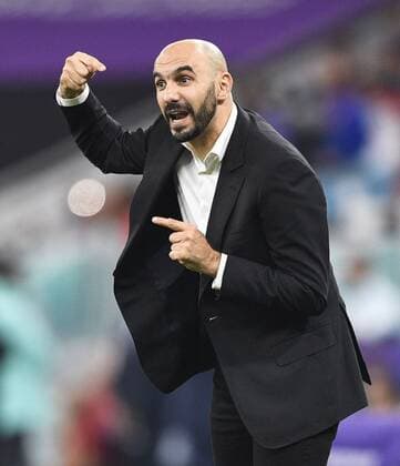 Football World Cup in Qatar Morocco head coach Walid Regragui gives instructions during the first half of a World Cup quarterfinal football match against Portugal at Al Thumama Stadium in Doha, Qatar, on Dec. 10, 2022.  A14AA0001373781P 