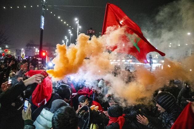 Moroccan football supporters celebrate the 1-0 win of the Moroccan football team on the Mercatorplein in Amsterdam in The Netherlands, 10 December 2022 after the match between Morocco and Portugal at the World Cup in Qatar. ANP OLAF KRAAK netherlands out - belgium out Amsterdam xVIxxIVx *** Moroccan football supporters celebrate the 1 0 win of the Moroccan football team on the Mercatorplein in Amsterdam in The Netherlands, December 10, 2022 after the match between Morocco and Portugal at the World Cup in Qatar ANP OLAF KRAAK netherlands out belgium out Amsterdam xVIxxIVx 459210981 originalFilename: 0196377639st.jpg