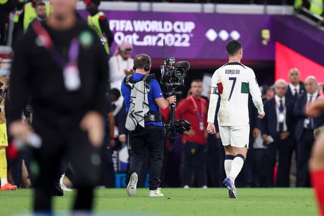 (221210) -- DOHA, Dec. 10, 2022 -- Cristiano Ronaldo of Portugal leaves the pitch after they lost the Quarterfinal between Morocco and Portugal of the 2022 FIFA World Cup, WM, Weltmeisterschaft, Fussball at Al Thumama Stadium in Doha, Qatar, Dec. 10, 2022. ) (SP)QATAR-DOHA-2022 WORLD CUP-QUARTERFINAL-MAR VS POR LixGang 