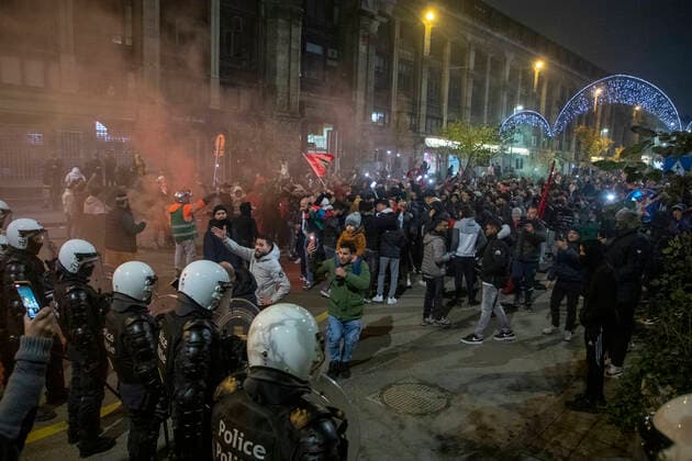 Illustration picture shows Moroccan supporters celebrating their victory in the center of Brussels, after winning the quarter final game between Morocco and Portugal, at the FIFA 2022 World Cup, on Saturday 10 December 2022. NICOLASxMAETERLINCK  x55718146x