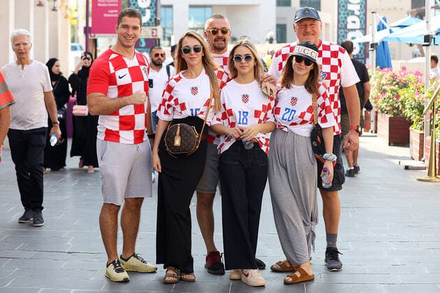 QATAR 2022 - Croatian fans in the old town of Souq Waqif in Doha Croatian fans in the old town of Souq Waqif in Doha at the World Cup in Qatar ahead of the semi-final match with Argentina, in Doha, Qatar, on December 13, 2022, GoranxStanzl PIXSELL