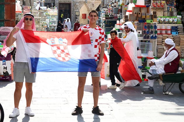 QATAR 2022 - Croatian fans in the old town of Souq Waqif in Doha Croatian fans in the old town of Souq Waqif in Doha at the World Cup in Qatar ahead of the semi-final match with Argentina, in Doha, Qatar, on December 13, 2022, GoranxStanzl PIXSELL