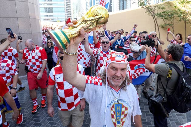 QATAR 2022 - Croatian fans unfurled a 200m long flag on the beach in front of the Hilton Doha Hotel Croatian fans unfurled a 200m long flag on the beach in front of the Hilton Doha Hotel to support the national team, Nationalteam before the semi-final match against Argentina at the World Cup in Qatar, in Doha, Qatar, on December 13, 2022, IgorxKralj PIXSELL