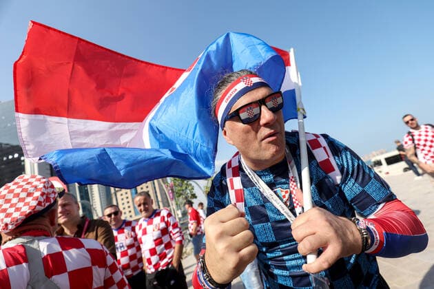 QATAR 2022 - Croatian fans unfurled a 200m long flag on the beach in front of the Hilton Doha Hotel Croatian fans unfurled a 200m long flag on the beach in front of the Hilton Doha Hotel to support the national team, Nationalteam before the semi-final match against Argentina at the World Cup in Qatar, in Doha, Qatar, on December 13, 2022, IgorxKralj PIXSELL