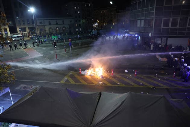 Illustration picture shows police, as small riots break out, in the streets of Brussels city center, after Morocco lost the semi-final match of Morocco vs France, at the FIFA 2022 World Cup, on Wednesday 14 December 2022. JAMESxARTHURxGEKIERE  x56188379x