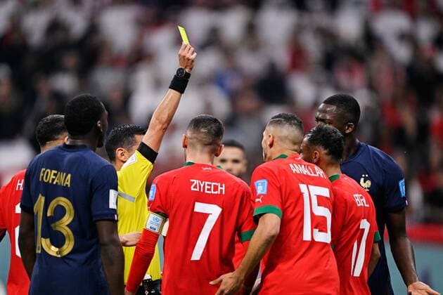 RECORD DATE NOT STATED FIFA World Cup, WM, Weltmeisterschaft, Fussball Qatar 2022 France vs Morocco SF Referee Cesar Arturo Ramos of Mexico shows yellow card to Sofiane Boufal of Morocco during the game France vs Morocco, corresponding to the Semifinals of the FIFA World Cup Qatar 2022, at Al Bayt Stadium, Al Khor, Doha, on December 14, 2022. <br><br> Arbitro Cesar Arturo Ramos de Mexico muestra tarjeta amarilla a Sofiane Boufal de Marruecos durante el partido Francia vs Marruecos, correspondiente a Semifinales de la Copa Mundial de la FIFA Catar 2022, en el Estadio Al Bayt, Al Khor, Doha, el 14 de Diciembre de 2022 AL KHOR DOHA QATAR  Copyright: xJorgexMartinezx 20221214_9847