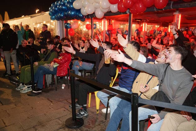 Atmosphere on the terraces of cafes and on the old port in Marseille after the victory of France in the semi-final of the football world cup against Morocco in Qatar.  GillesxBaderx xLexPictorium LePictorium_0271802