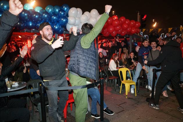 Atmosphere on the terraces of cafes and on the old port in Marseille after the victory of France in the semi-final of the football world cup against Morocco in Qatar.  GillesxBaderx xLexPictorium LePictorium_0271805