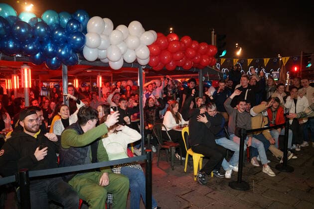 Atmosphere on the terraces of cafes and on the old port in Marseille after the victory of France in the semi-final of the football world cup against Morocco in Qatar.  GillesxBaderx xLexPictorium LePictorium_0271811