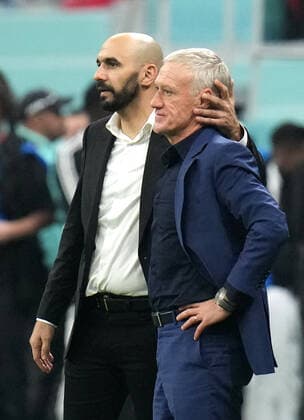 AL KHOR, QATAR - DECEMBER 14: Didier Deschamps head coach of France greets Walid Regragui head coach of Morocco after the victory ,during the FIFA World Cup, WM, Weltmeisterschaft, Fussball Qatar 2022 semi final match between France and Morocco at Al Bayt Stadium on December 14, 2022 in Al Khor, Qatar. WCS 