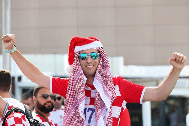 Croatia fans carry 200 meters flag Supporters of Croatia are seen prior FIFA World Cup, WM, Weltmeisterschaft, Fussball Qatar 2022 bronze medal match between Croatia and Morocco at Hilton Doha beach in Doha, Qatar on December 17, 2022. Fans carry 200 meters long flag of Croatia. GoranxStanzl PIXSELL