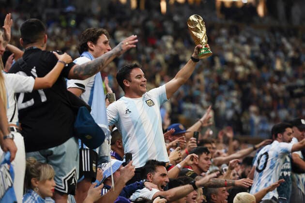 (221218) -- LUSAIL, Dec. 18, 2022 -- Fans of Argentina celebrate their victory after the penalty shoot-out of the Final between Argentina and France at the 2022 FIFA World Cup, WM, Weltmeisterschaft, Fussball at Lusail Stadium in Lusail, Qatar, Dec. 18, 2022. ) (SP)QATAR-LUSAIL-2022 WORLD CUP-FINAL-ARG VS FRA LanxHongguang 