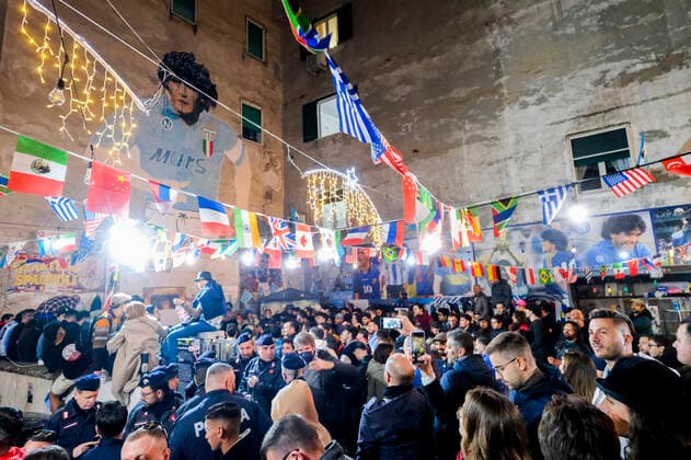 the argentinean celebration victory wolrd cup in naples Argentina world champion in Naples the Argentinean community together with Neapolitans celebrate the victory of the selection under the historic mural of Diego Armando Maradona in the Spanish quarters ABPH6716 Copyright: xAntonioxBalascox