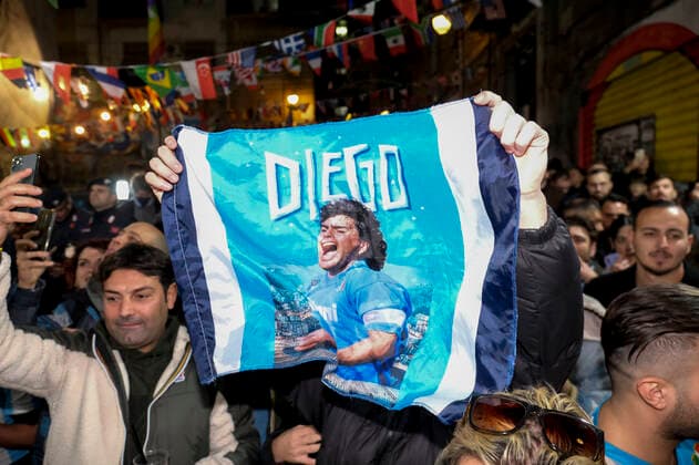 the argentinean celebration victory wolrd cup in naples Argentina world champion in Naples the Argentinean community together with Neapolitans celebrate the victory of the selection under the historic mural of Diego Armando Maradona in the Spanish quarters ABPH6870 Copyright: xAntonioxBalascox