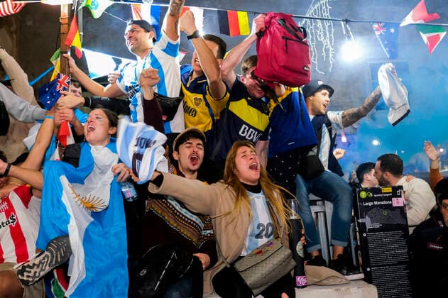 the argentinean celebration victory wolrd cup in naples Argentina world champion in Naples the Argentinean community together with Neapolitans celebrate the victory of the selection under the historic mural of Diego Armando Maradona in the Spanish quarters ABPH6942 Copyright: xAntonioxBalascox