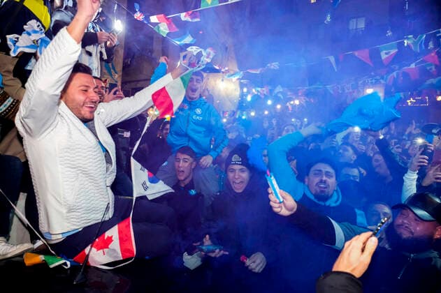 the argentinean celebration victory wolrd cup in naples Argentina world champion in Naples the Argentinean community together with Neapolitans celebrate the victory of the selection under the historic mural of Diego Armando Maradona in the Spanish quarters ABPH7076 Copyright: xAntonioxBalascox