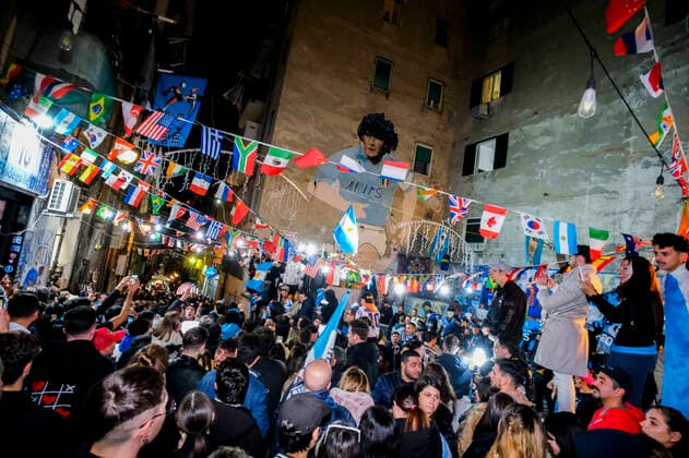 the argentinean celebration victory wolrd cup in naples Argentina world champion in Naples the Argentinean community together with Neapolitans celebrate the victory of the selection under the historic mural of Diego Armando Maradona in the Spanish quarters ABPH7212 Copyright: xAntonioxBalascox