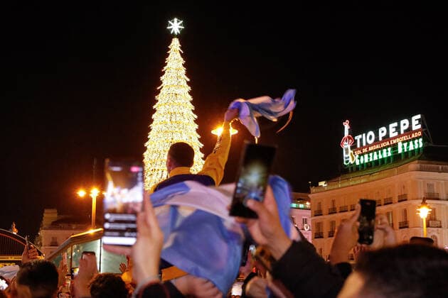 Argentina s supporters celebrate the victory in the Football World Cup Qatar 2022 in the Puerta del Sol of Madrid. December 18, 2022. (2022121805)