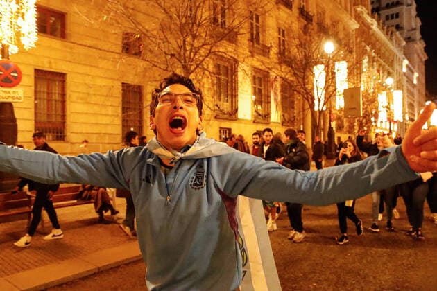 Argentina s supporters celebrate the victory in the Football World Cup Qatar 2022 in the Puerta del Sol of Madrid. December 18, 2022. (2022121836)